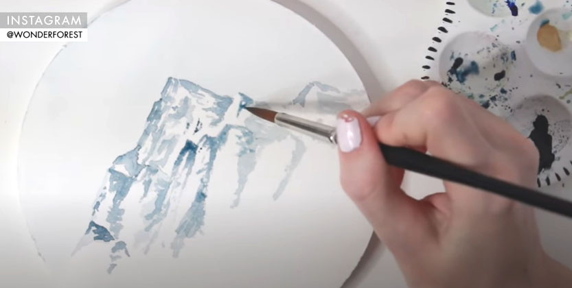 painting a mountain with watercolours